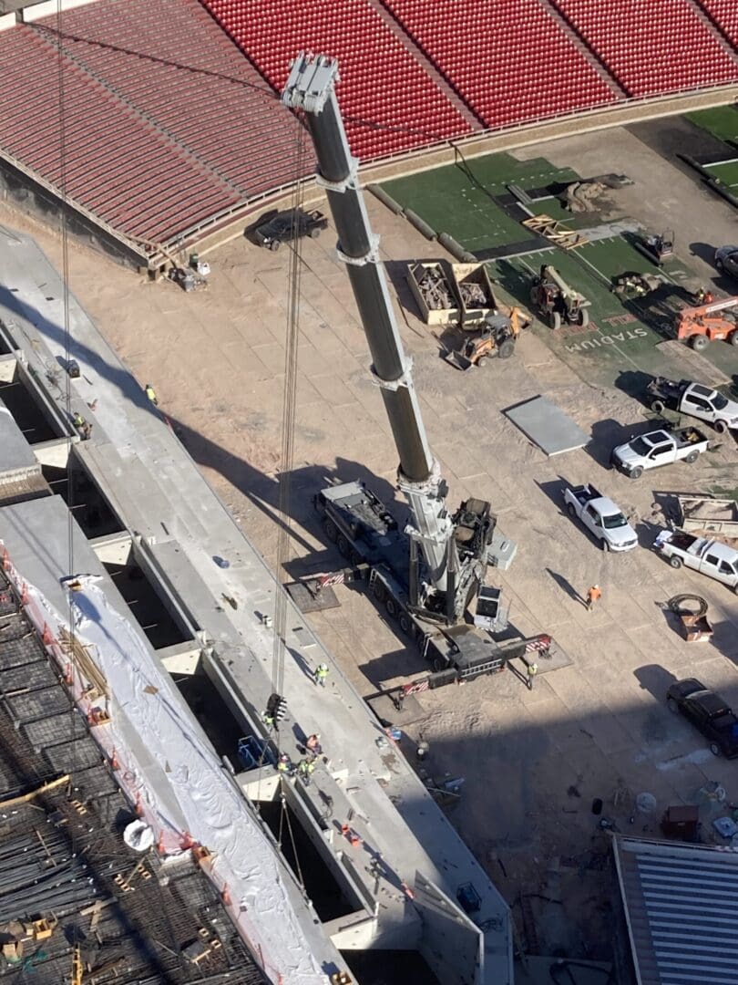 A crane is being used to lift the concrete.